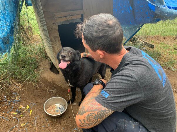 Rusty with PETA fieldworker